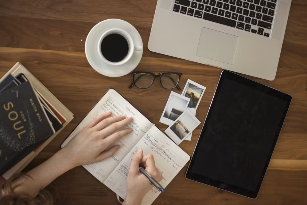 Person journaling for mental wellbeing